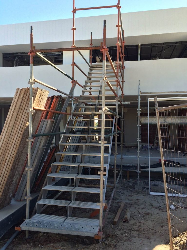 A picture of Bacic1 with our stairway scaffolding.